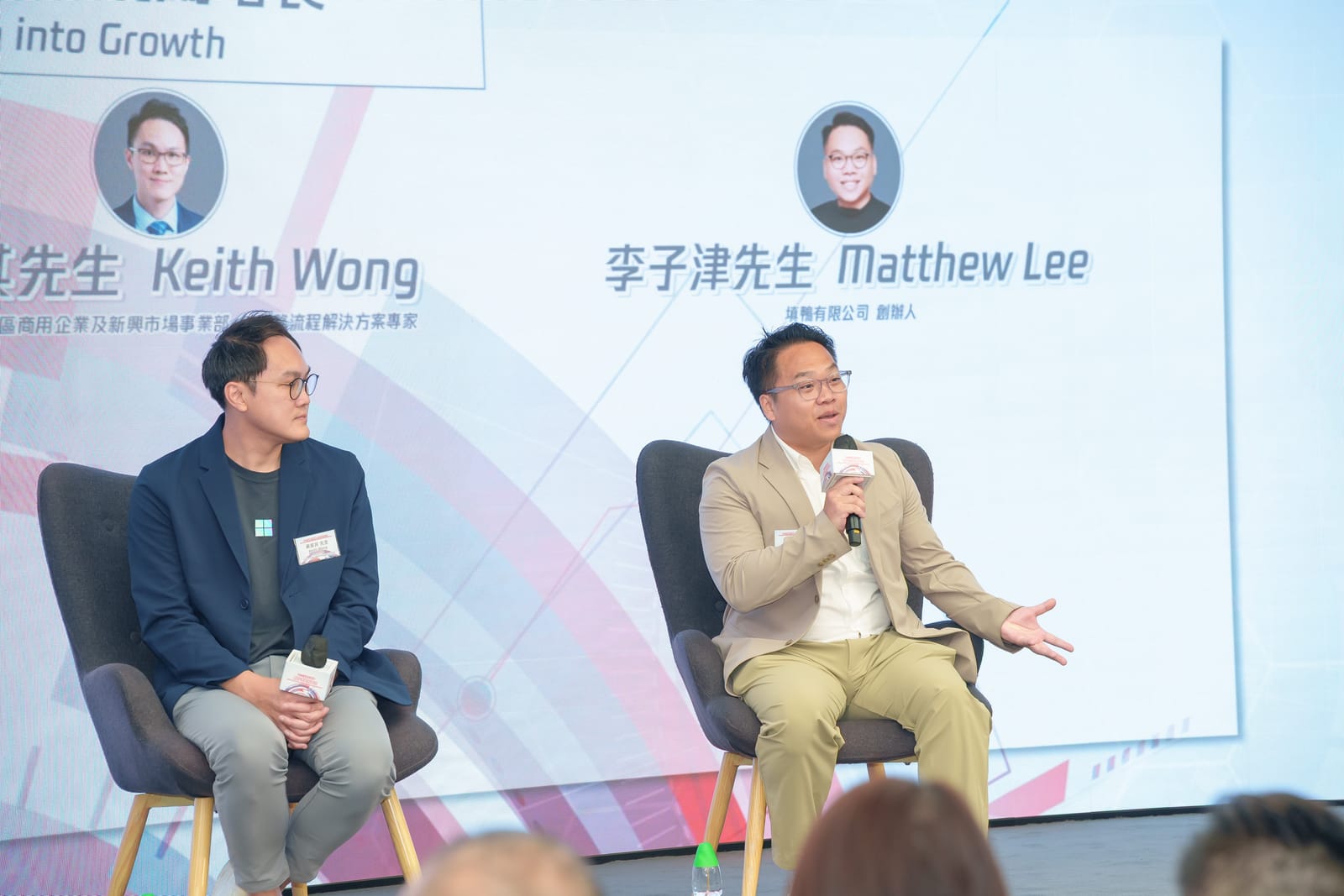 Matthew Lee speaking on the SME Forum panel beside Keith Wong